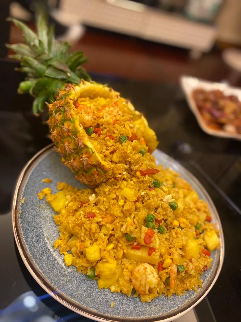 详细阅读:菠萝炒饭:热带风情与味蕾的完美邂逅 菠萝炒饭:热带风情与味蕾的完美邂逅